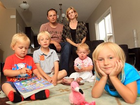 Greg and Ainsley Tymchyna, with their children, from left, Reid, Avery, Natalie, and Taylor.