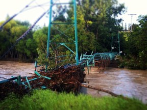 The wobbly old pedestrian bridges over the Elbow River were destroyed by June's flooding.