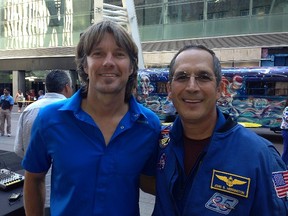 Chris “the potato farmer” Perry with Commander John Herrington, the first Native American to walk in space, at the Beakerhead event on Stephen Avenue Walk.