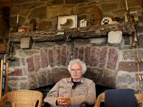 Charlie Russell, a Canadian naturalist has studied the relationship between humans and  bears for many years. He was photographed at his cabin, called the Hawks Nest, near Waterton Lakes National Park.
