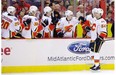 Calgary Flames winger David Jones celebrates his goal with teammates.