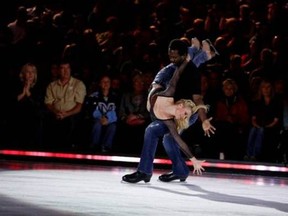 Shae-Lynn Bourne and Anson Carter skated to Bryan Adams' Run to You.