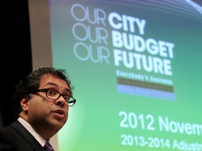 Nenshi launches the 2013 budget adjustments. For release of 2014's numbers, he'll be in Edmonton, then on vacation for a week. Leah Hennel/Herald