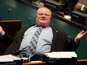 Rob Ford's recent troubles have been put to music by the Calgary Opera. Here, Ford reacts to Toronto City Council during a debate about removing some of his mayoral powers.