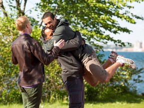 Tim Sr. and Tim Jr. celebrate winning the first Amazing Race Canada in a photo released on Monday Sept. 16, 2013. Canadians made the show a huge hit in 2013.