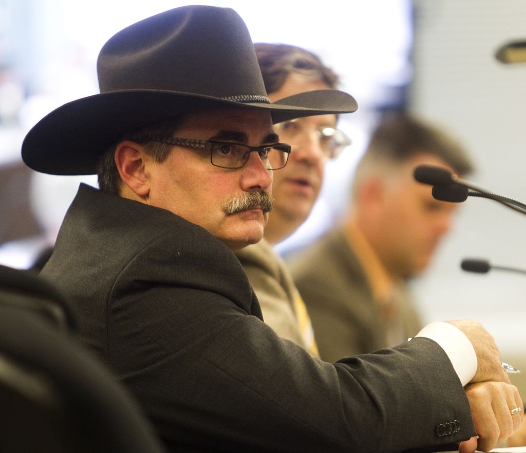 From left: Fire Chief Bruce Burrell, city manager Owen Tobert, transportation GM Mac Logan at a July 2013 council committee meeting. Ted Rhodes/Herald