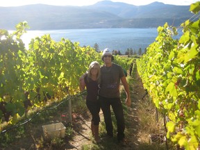 Sheri-Lee Turner-Krouzel and Curtis Krouzel take a break from work in their vineyard at 50th Parallel Estate.