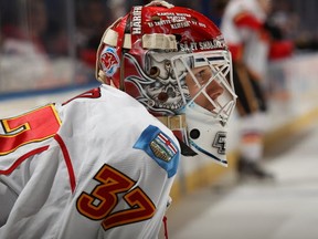 Joni Ortio #37 of the Calgary Flames during warm ups before taking on the New York Islanders at Nassau Coliseum on February 6.