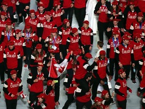 Team Canada enters the arena during the Sochi closing ceremony.( Matthew Stockman/Getty Images)