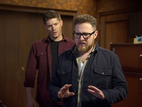 Ghostfacer Ed Zeddmore (A.J. Buckley), right, talks with Dean Winchester (Jensen Ackles) in Tuesday's episode of Supernatural.