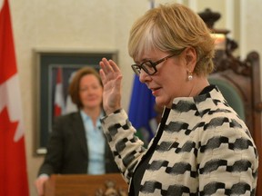 Donna Kennedy-Glans was sworn in as Alberta Associate Minister of Electricity and Renewable Energy at Government House in Edmonton on December 13, 2013. Today, she quit caucus to sit as an independent.