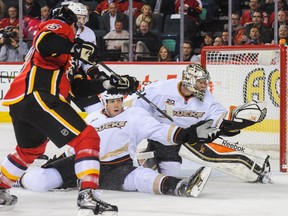 Mike Cammalleri #13 of the Calgary Flames takes a shot at the net of Frederik Andersen #31 of the Anaheim Ducks during an NHL game at Scotiabank Saddledome on March 12, 2014 in Calgary.