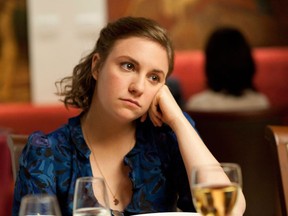 This undated image released by HBO shows Lena Dunham in a scene from the series "Girls." Dunham created, wrote, directed, produced and starred in a half-hour comedy series about 20-something adulthood, femininity and sexuality. ()