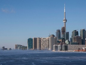 Canada's top earners are most likely to live in cities, with Toronto (pictured) and Calgary being home to nearly half of top earners in a period ending 2006.