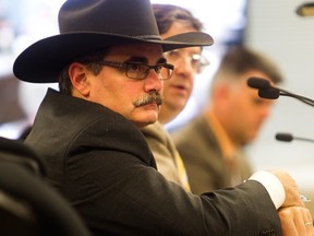 From left: emergency director Bruce Burrell, city manager Owen Tobert and transportation general manager Mac Logan at a post-flood council meeting in July 2013. Ted Rhodes/Herald