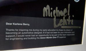 A note on the collage from Michael Lehti to his former teacher, Karlene Berry, 67, thanking her for her support and motivation, is pictured Friday, May 9, 2014.  Lehti graduated from Benson in 1981 and credits Berry with motivating him to success.  Lehti was part of team that engineered and built the Aston Martin One-77.  (DAX MELMER/The Windsor Star)