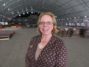 Cheryl Skorpack, concession manager, food and beverage, Calgary Stampede, stands in Nashville North which is being set up in a new location this year.