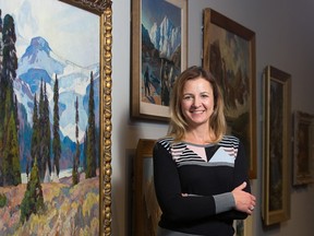 The Glenbow's Melanie Kjorlien poses in A Singular Vision: Eric Harvie Collects Art exhibit, which opens Saturday.