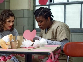 Morello (Yael Stone), left, and Suzanne, a.k.a. Crazy Eyes (Uzo Aduba) share a moment on Valentine's Day on the second season of Orange is the New  Black. The season is available on Netflix Canada on Friday.