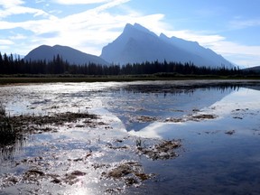 Mount Rundle casts a shadow on Vermilion Lakes in Banff National Park in August 2013.