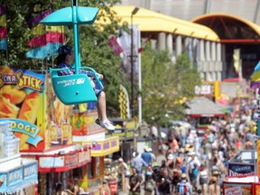 The crowds at the Calgary Stampede in Calgary, Alberta Wednesday, July 9, 2014.