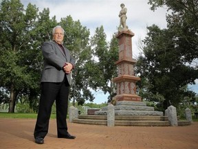 Robert Bruce Shepard, Esplanade Museum curator, at the monument in Riverside Veterans Memorial Park in Medicine Hat, Alberta.
