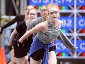 Maggie Myles and her fellow members of The Young Canadians rehearse a number in this year's Grandstand show at the Calgary Stampede.