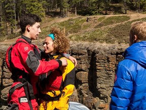 Cormac give his mom Nicole a hug when the pair learn from host Jon Montgomery that they've been eliminated from The Amazing Race Canada.