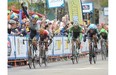 Daryl Impey from South Africa celebrates as he crosses in first at the finishline during Stage 5, a 124 km 11 lap circuit through downtown Edmonton at the 2014 Tour of Alberta in Edmonton, September 7, 2014. He also wins race leader for the Tour