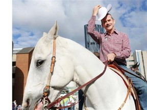 The 101st Calgary Stampede Parade Marshal Chris Hadfield on Jag during the parade in Calgary on July 5, 2013.