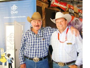 Acumen Capital Partners vice-president/director Rob Laidlaw, left, and longtime friend and Calgary Stampede director Dana Peers. Some of the funds raised from the annual Stampede Kick Off party will go toward a memorial fund set up in the memory of Peers’ son Dusty, who died in a car crash two years ago. The event is now in its 26th year and has raised well over $1 million for charitable causes devoted to children.