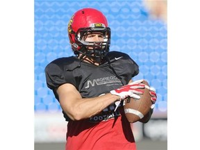 Adam Konar participates in drills during the U of C Dinos football training camp at McMahon Stadium last week. He tied for the team lead in tackles during last weekend’s exhibition game at Laval.