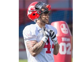 Ben D’Aguilar takes part in practice drills during Stamps training camp at McMahon Stadium in Calgary on Monday.