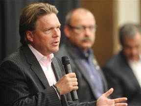 Alberta Conservative leadership candidates, from left, Thomas Lukaszuk, Ric McIver and Jim Prentice take part in the final leadership forum, sponsored by the Rotary Club of Calgary, on Friday at the Grey Eagle Casino.