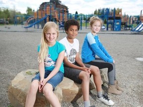 Alexander Ferguson School Grade 6 students Gabriela Kirk, from left, Niko Proverbs and Peyton Dutcher say a new “buddy bench,” which will be installed on the school playground on Tuesday, will be a valuable way to “bring the school closer together,” and ease feeling of isolation felt by some students.