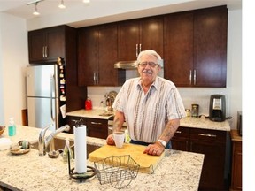 Wil Andruschak 
 Rudy Suderman has morning coffee in the kitchen of his new condo at Mosaic Mirage in McKenzie Towne.