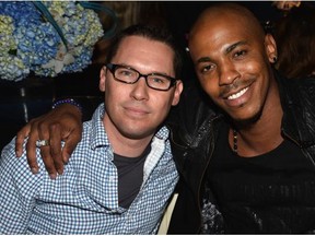 Director Bryan Singer (L) and actor Mehcad Brooks attend the STK Los Angeles 6th Anniversary Party at STK on June 4, 2014 in Los Angeles, California. A lawsuit involving singer has been dropped.