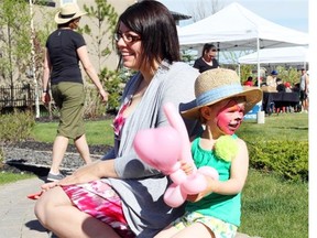 Annistyn Rattai, 2, and mom Heather at the celebration.