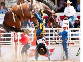 The annual Calgary Stampede attracts tourists from around the world.