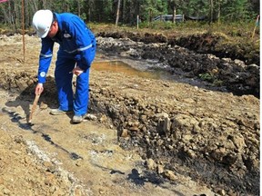 Bitumen emulsion seeps up through a fissure at Canadian Natural Resources Limited (CNRL) Primrose oilsand project sites north of Cold Lake, Aug. 8, 2013.
