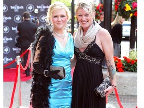 Brittany Tudo, left, and Tish Scott wore their best as they walked on the red carpet of the Big Rock Eddies at the Jack Singer Concert Hall on June 4, 2012.