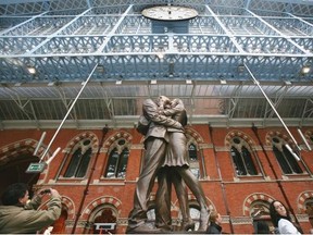 A bronze statue of a couple embracing is pictured at the new St. Pancras International Station in London, England. The station is the one you’ll use if you take the Chunnel.