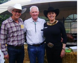 Bruce Maclennan, centre, of Century Services Inc., hosted this special and well-attended event during Stampede, where he was joined by Alberta Ballet artistic director Jean Grand-Maitre, left, and board chairwoman Dawn McDonald, right. The annual pig roast raises important funds for the Alberta Ballet.