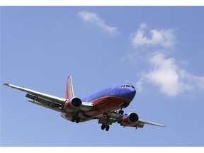 A Southwest Airlines Boeing 737 comes in for a landing at Love Field in Dallas.