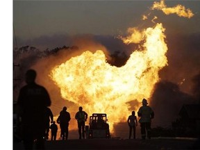 FILE - In this Sept. 9, 2010 file photo, a massive fire roars through a mostly residential neighborhood in San Bruno, Calif. A report released Friday by the Department of Transportation’s inspector general says the federal agency responsible for making sure states effectively oversee the safety of natural gas and other pipelines is falling down on the job. (AP Photo/Paul Sakuma, File)