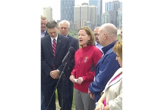 Calgary, Alberta: June 24, 2013  -- Alison Redford speaks to the media after her government committed one billion for assistance in flood relief.   ( James Wood, Calgary Herald) For City section story by James Wood.