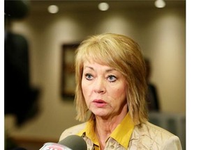 Calgary, Alberta; MARCH 26, 2014 -- Minister of Energy, Diana McQueen talks to the media at the 2nd International Energy Unconventional Gas Forum in Calgary on March 26, 2014. (Christina Ryan/Calgary Herald) For City story by TBA. Trax # {source4}