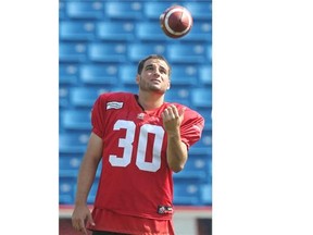Calgary Stampeders kicker Rene Parades tosses a ball during a lull in practice Wednesday.