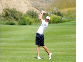 Calgary’s Evan Holmes, of Earl Grey, plays during the first round of the 2014 Sun Life Financial Alberta Men’s Amateur Championship at Desert Blume Golf Club in Medicine Hat on Tuesday. He is five shots back of leader Tyler Saunders going into Friday’s final round.