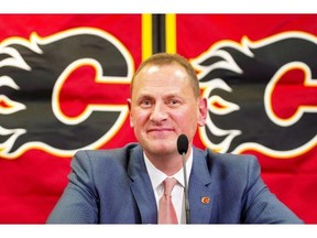 Calgary Flames' new GM Brad Treliving speaks at a press conference after being introduced in Calgary, Alta., on Monday, April 28, 2014. THE CANADIAN PRESS/Larry MacDougal